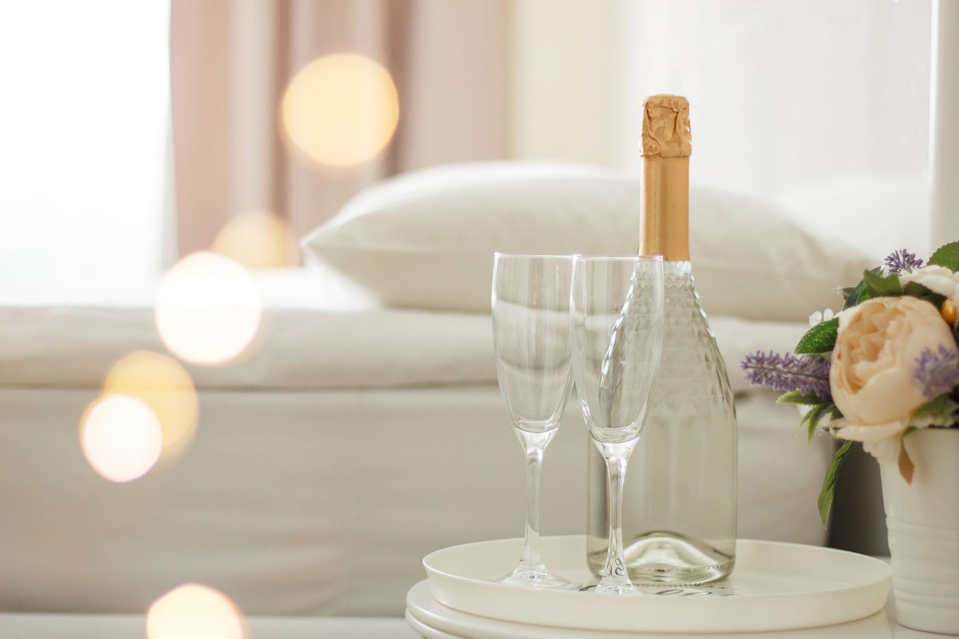 Welcome treats including sparkling wine prepared for a romantic couples' getaway