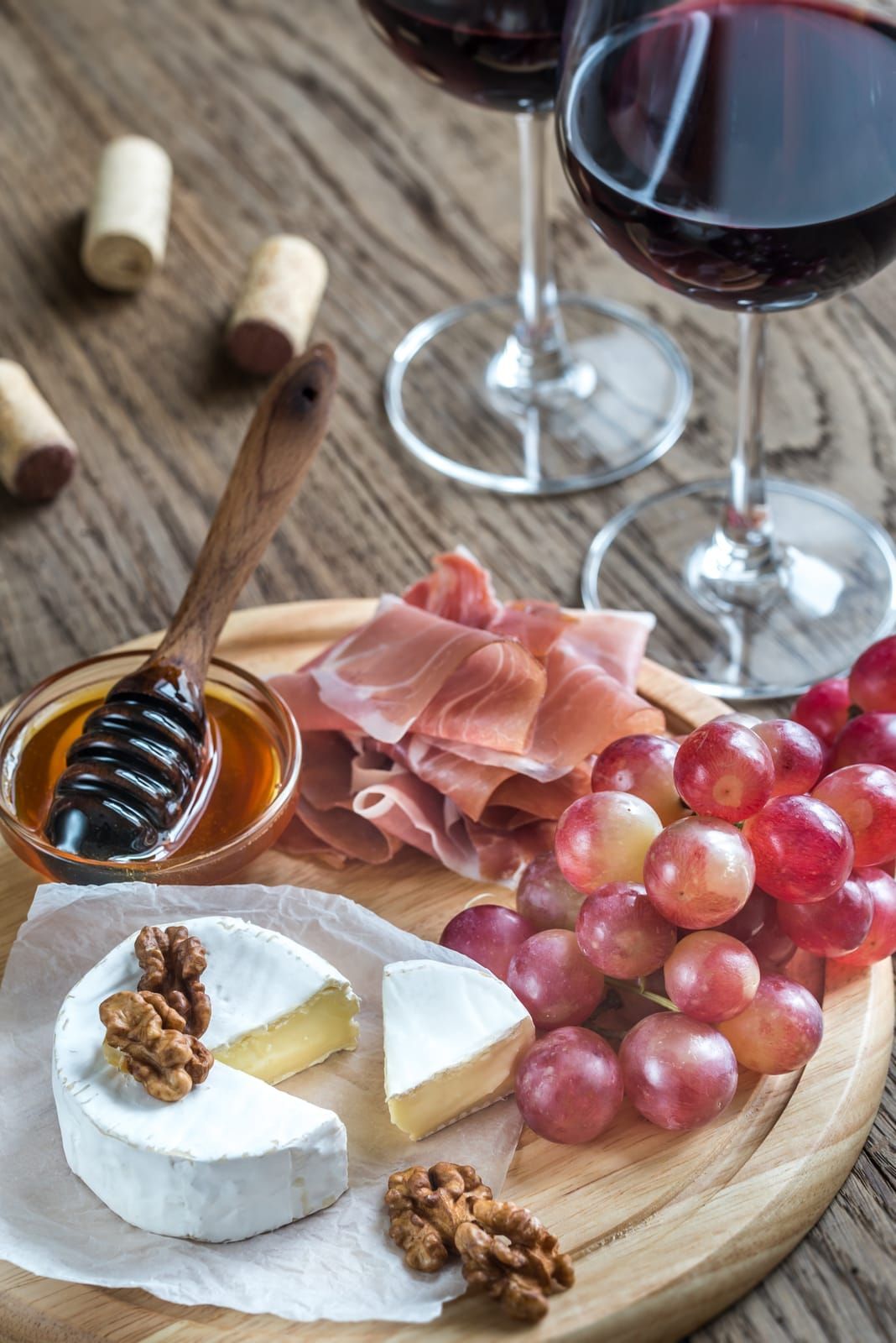 Couples sharing small plates and local wine at the Three Choirs Vineyard brasserie.