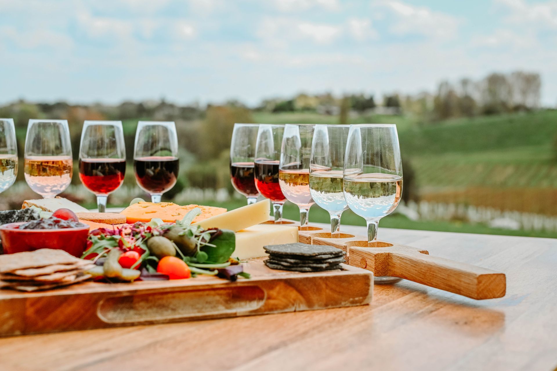 several bottles of three choirs wine are lined up on a table