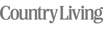 the country living logo is on a white background .