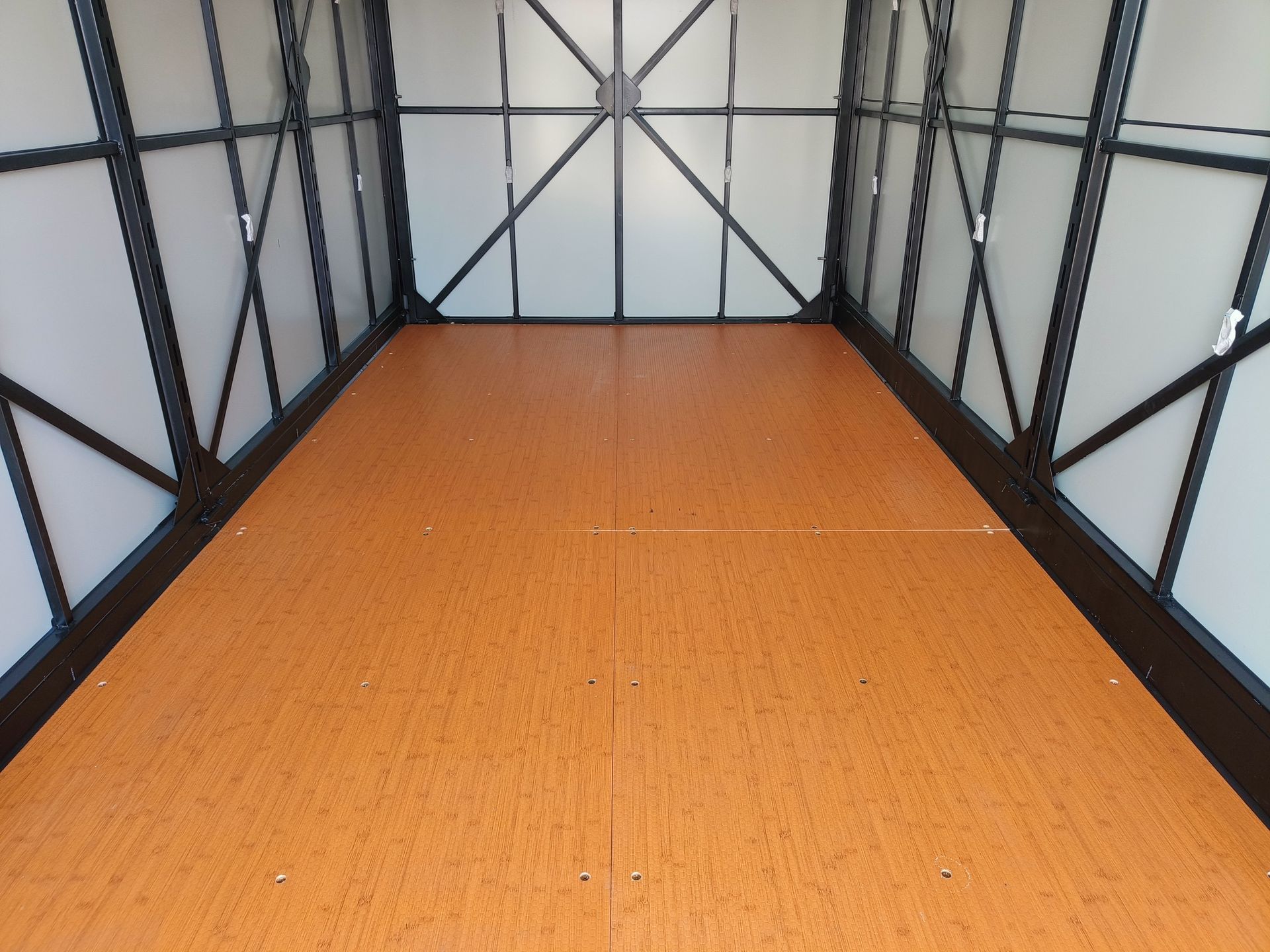 A picture of the inside of an empty mobile storage box