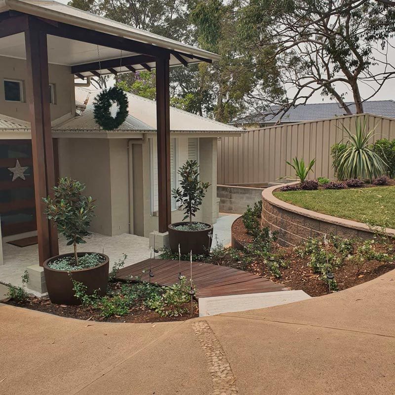 A House With A Christmas Wreath On The Porch — Green Envy Landscape & Garden Services In Cameron Park NSW