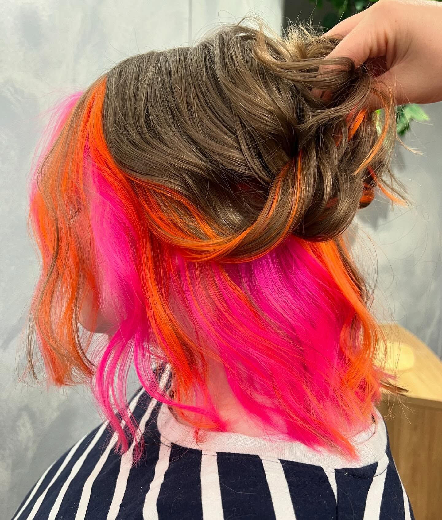 A Woman is Getting Her Hair Dyed in a Salon — AW Hair Studios - Surfers Paradise in Surfers Paradise, QLD