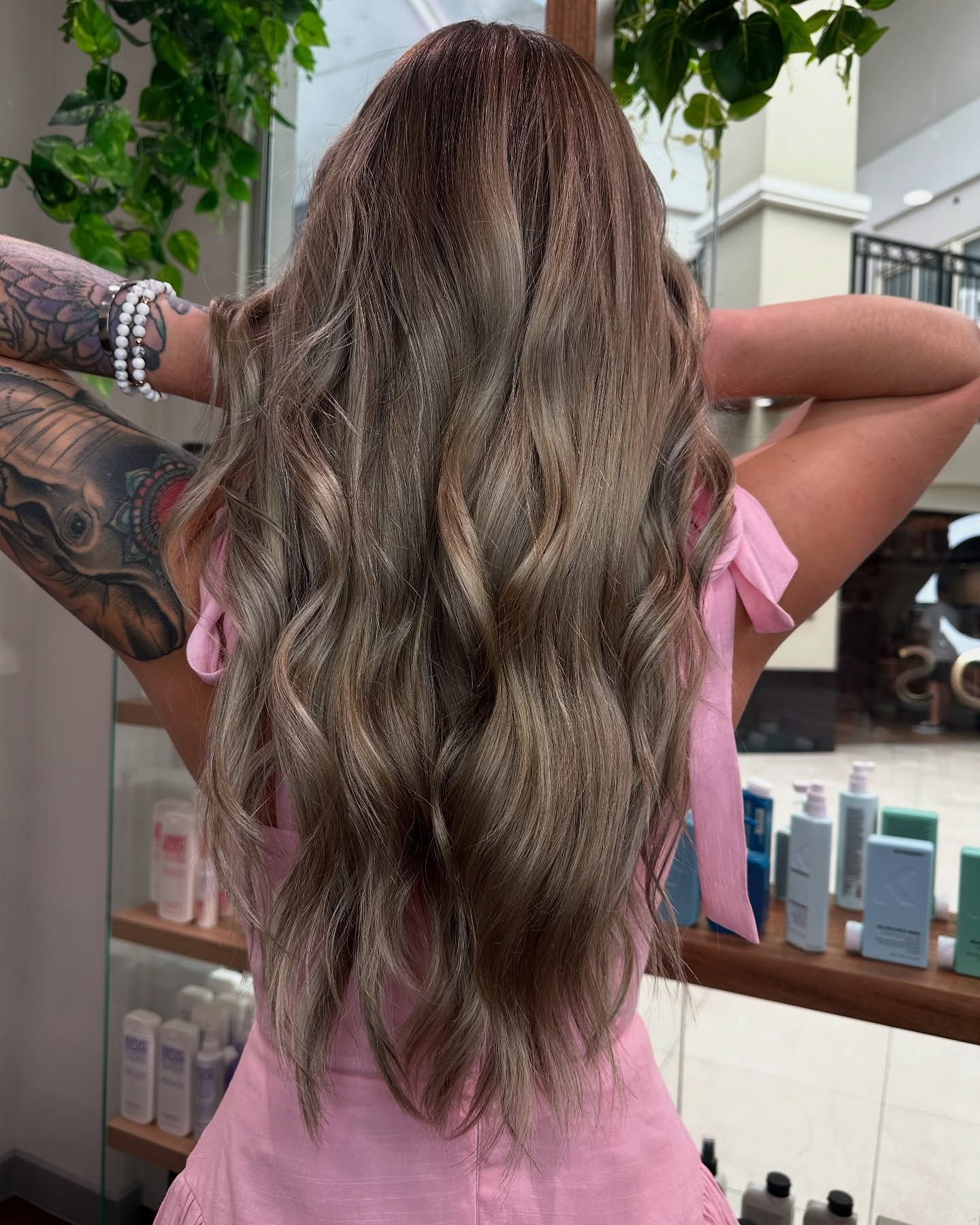 A Woman With Long Blonde Hair — AW Hair Studios - Surfers Paradise in Surfers Paradise, QLD