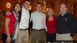 A group of people are posing for a picture together.