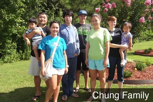 A group of people posing for a picture with the name chung family on the bottom