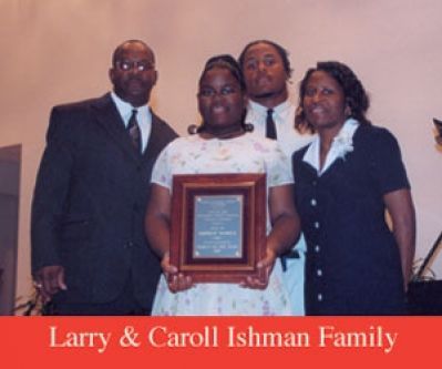 Larry and carol ishma family posing for a picture