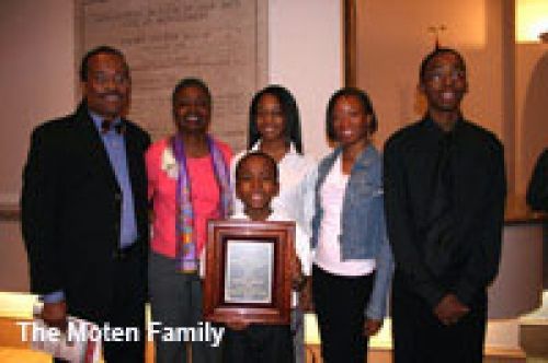The moten family is posing for a picture together