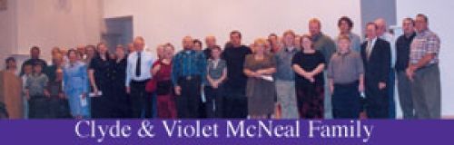 A group of people are posing for a picture with the name clyde and violet mcneal family