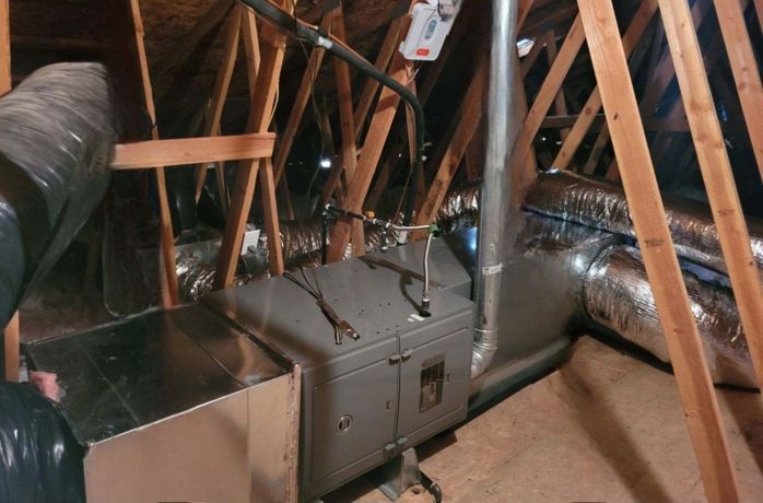 A room with a lot of pipes coming out of it