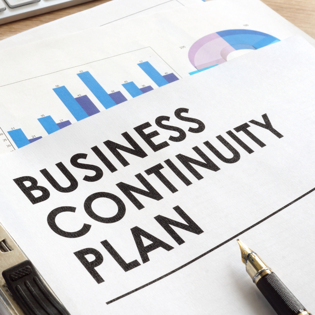 A business continuity plan with a pen on top of it