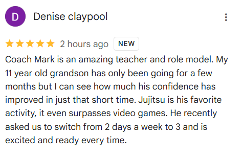 Review of Coach Mark, praising his teaching and role model skills. The reviewer's grandson enjoys Jujitsu and has improved confidence.