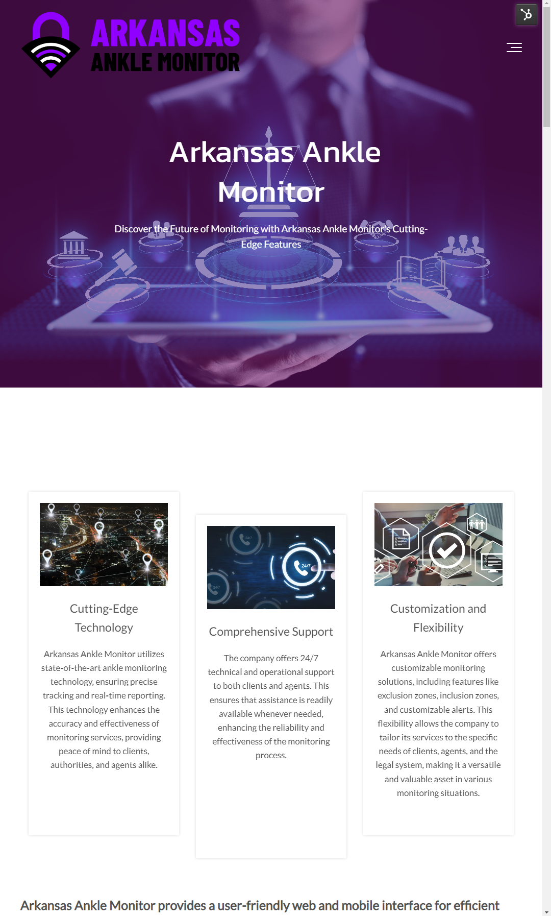 A man in a suit and tie is holding a tablet computer.