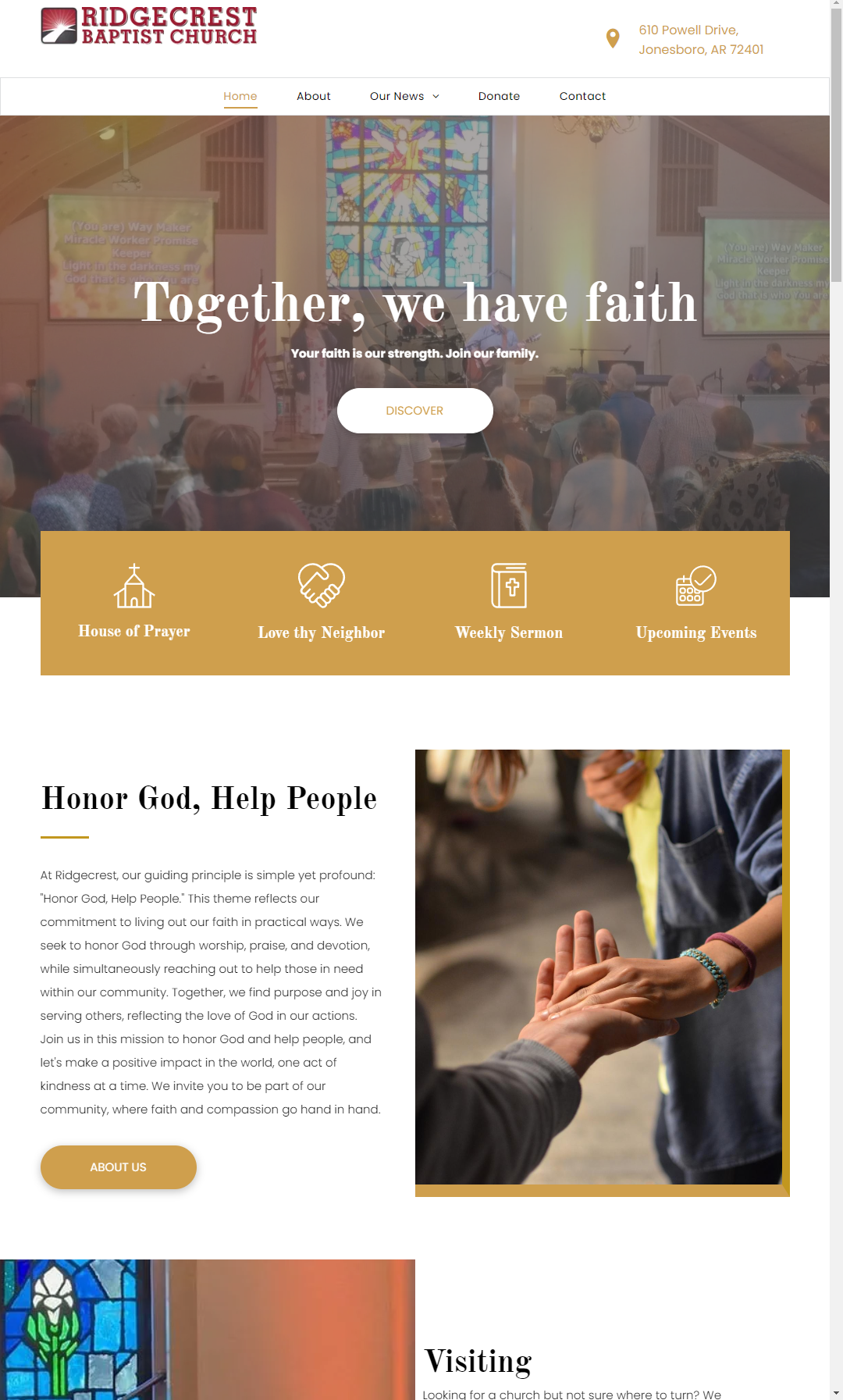 A person is holding another person 's hand on a website.