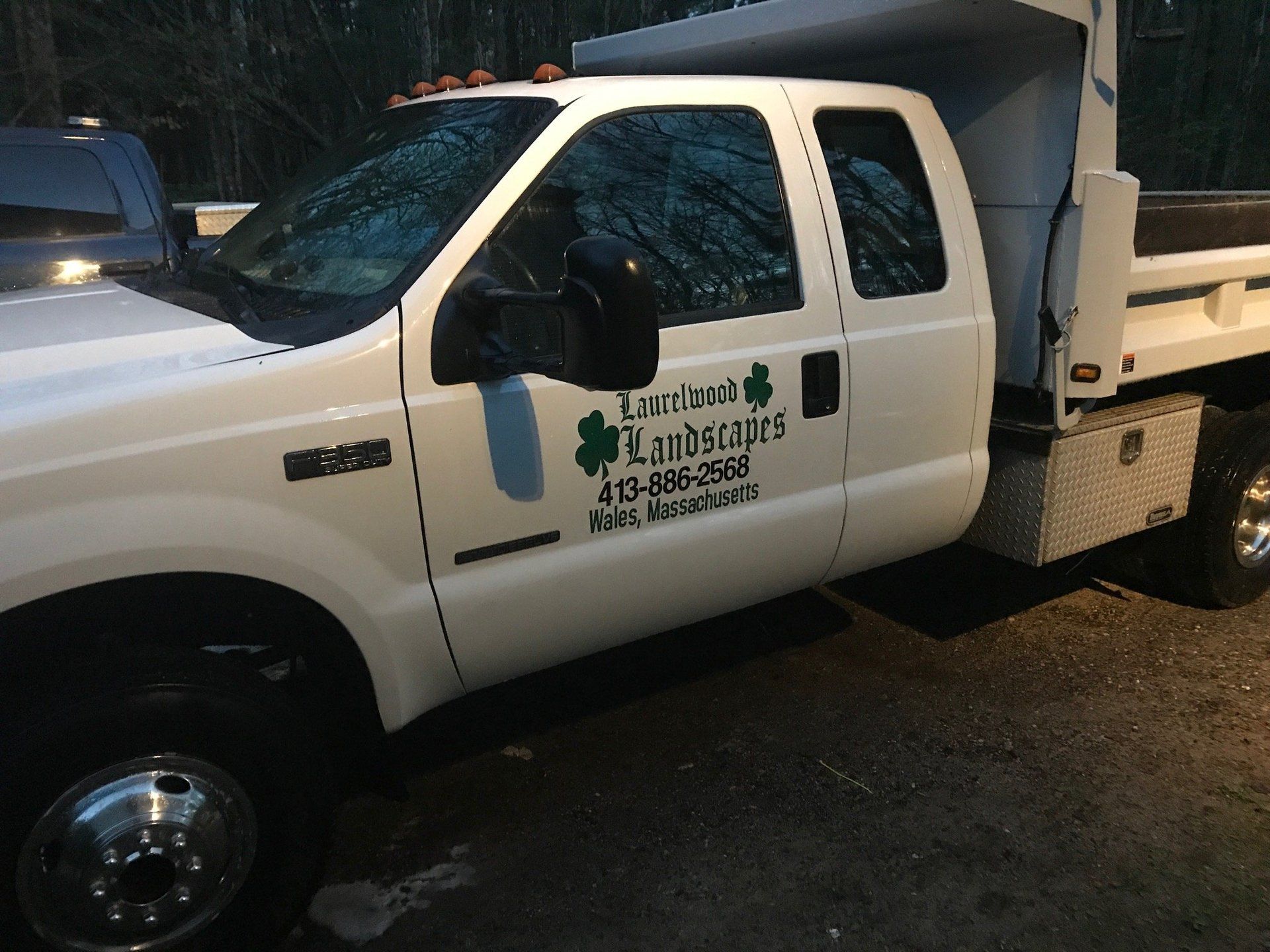laurelwood landscapes bobcat, truck, dump, and clean up services based in wales mass.