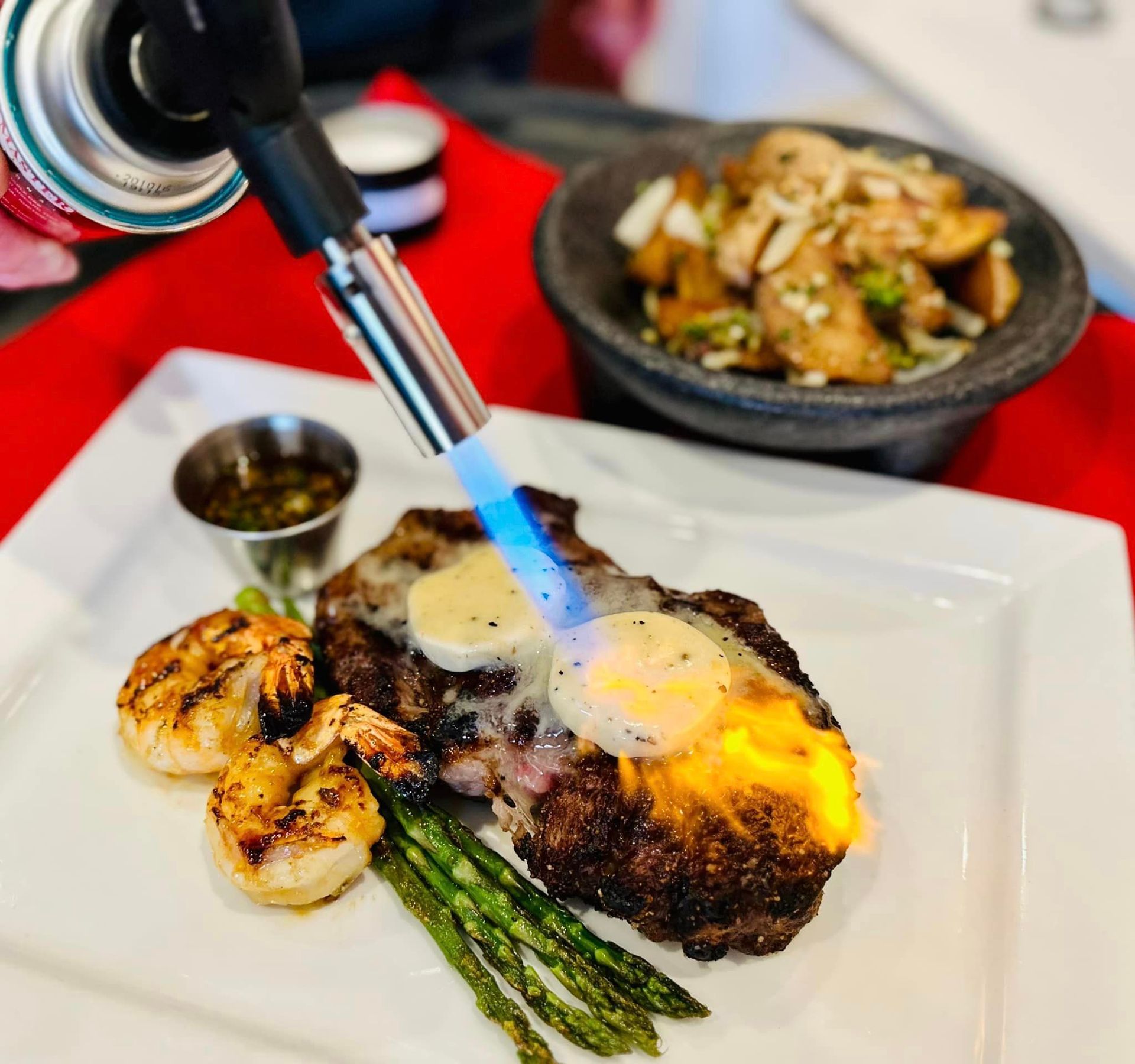 A close up of a plate of food with a torch on it.