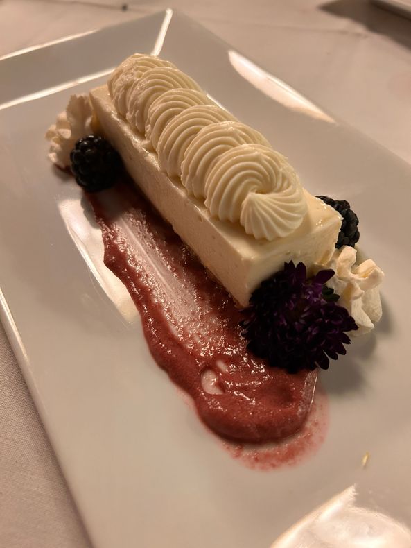 A close up of a plate of food on a table.