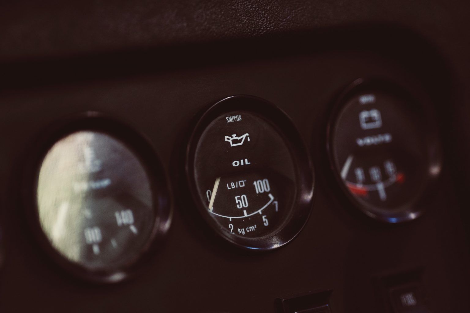 Dashboard gauges showing oil pressure at 50, fuel gauge, and a third gauge | Allegiance Automotive