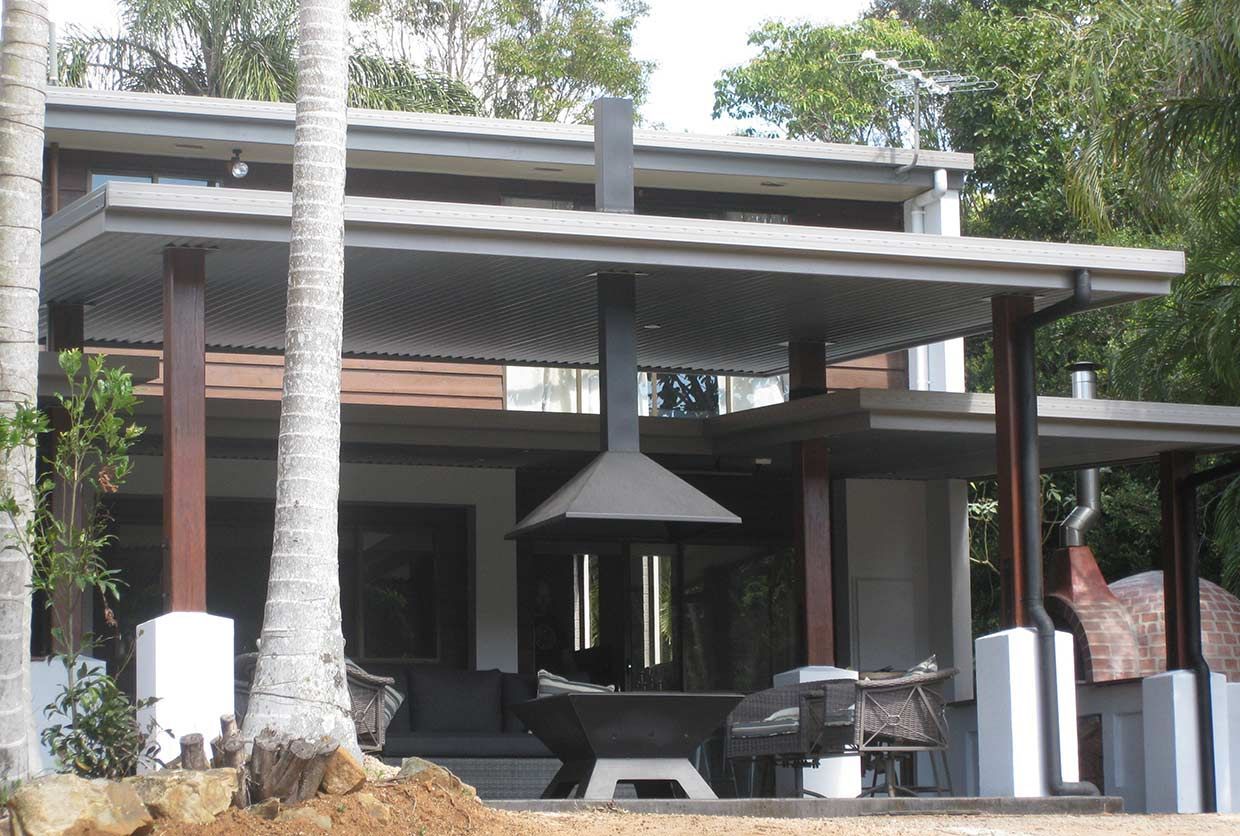 A House With a Roof That Has a Chimney on It — Sven Margraf Constructions Pty Ltd In Atherton QLD