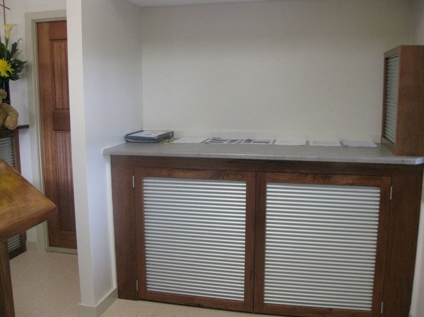 A Room With A Metal Cabinet And A Wooden Cabinet — Sven Margraf Constructions Pty Ltd In Atherton QLD