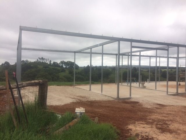A Large Metal Structure Is Being Built In The Middle Of A Dirt Field — Sven Margraf Constructions Pty Ltd In Atherton QLD