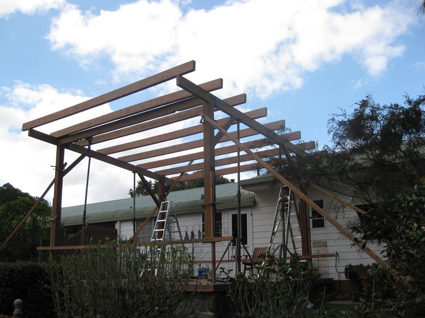 A Wooden Structure Is Being Built In Front Of A House — Sven Margraf Constructions Pty Ltd In Atherton QLD