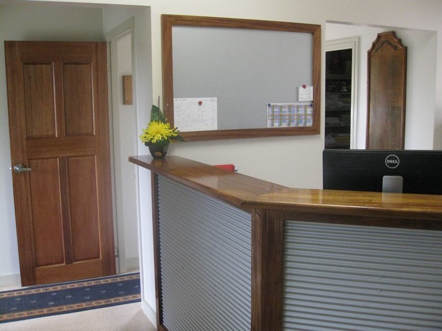 A Dell Computer Is On A Desk In A Room — Sven Margraf Constructions Pty Ltd In Atherton QLD