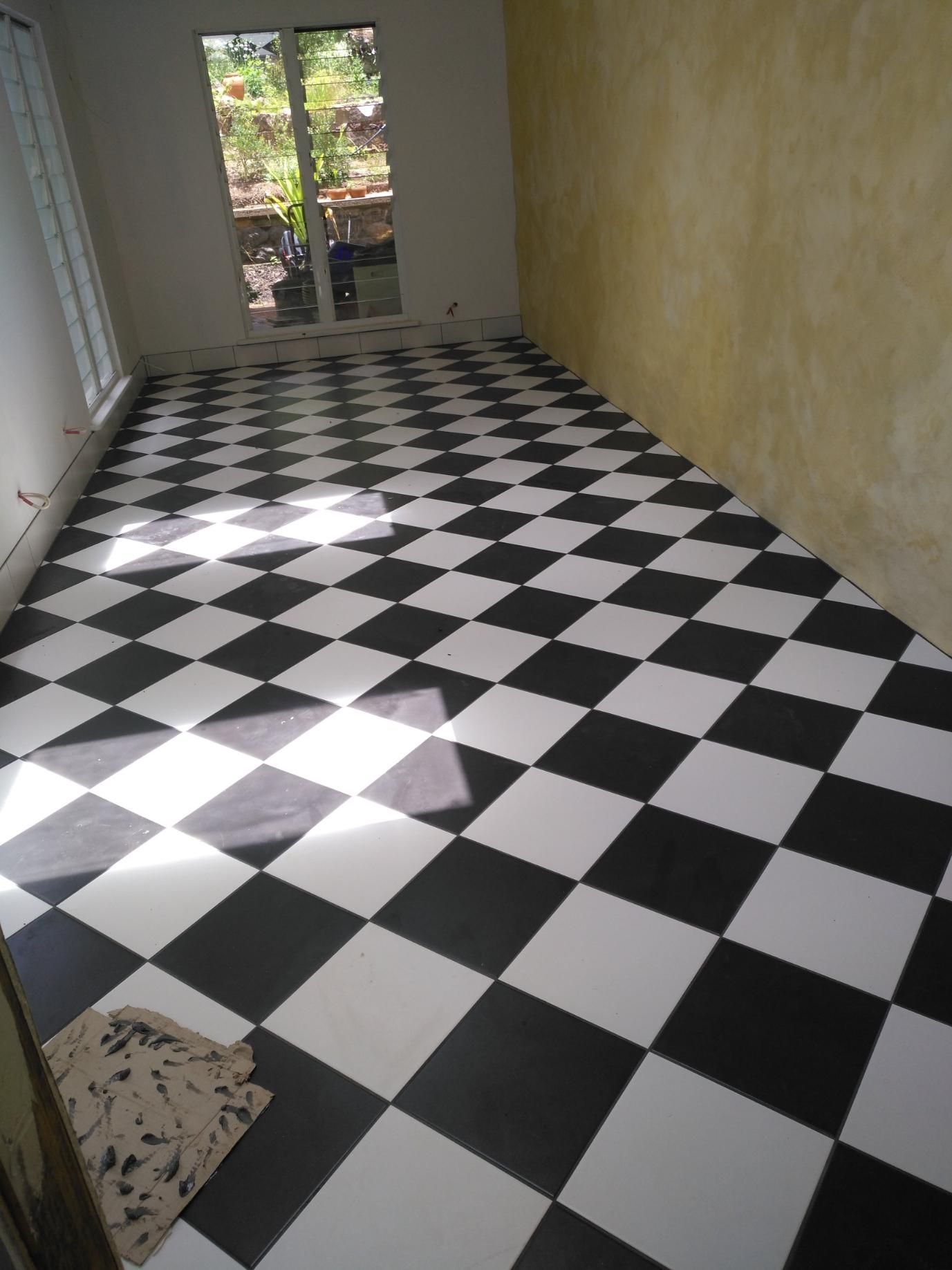 A Black And White Checkered Floor In A Room — Sven Margraf Constructions Pty Ltd In Atherton QLD