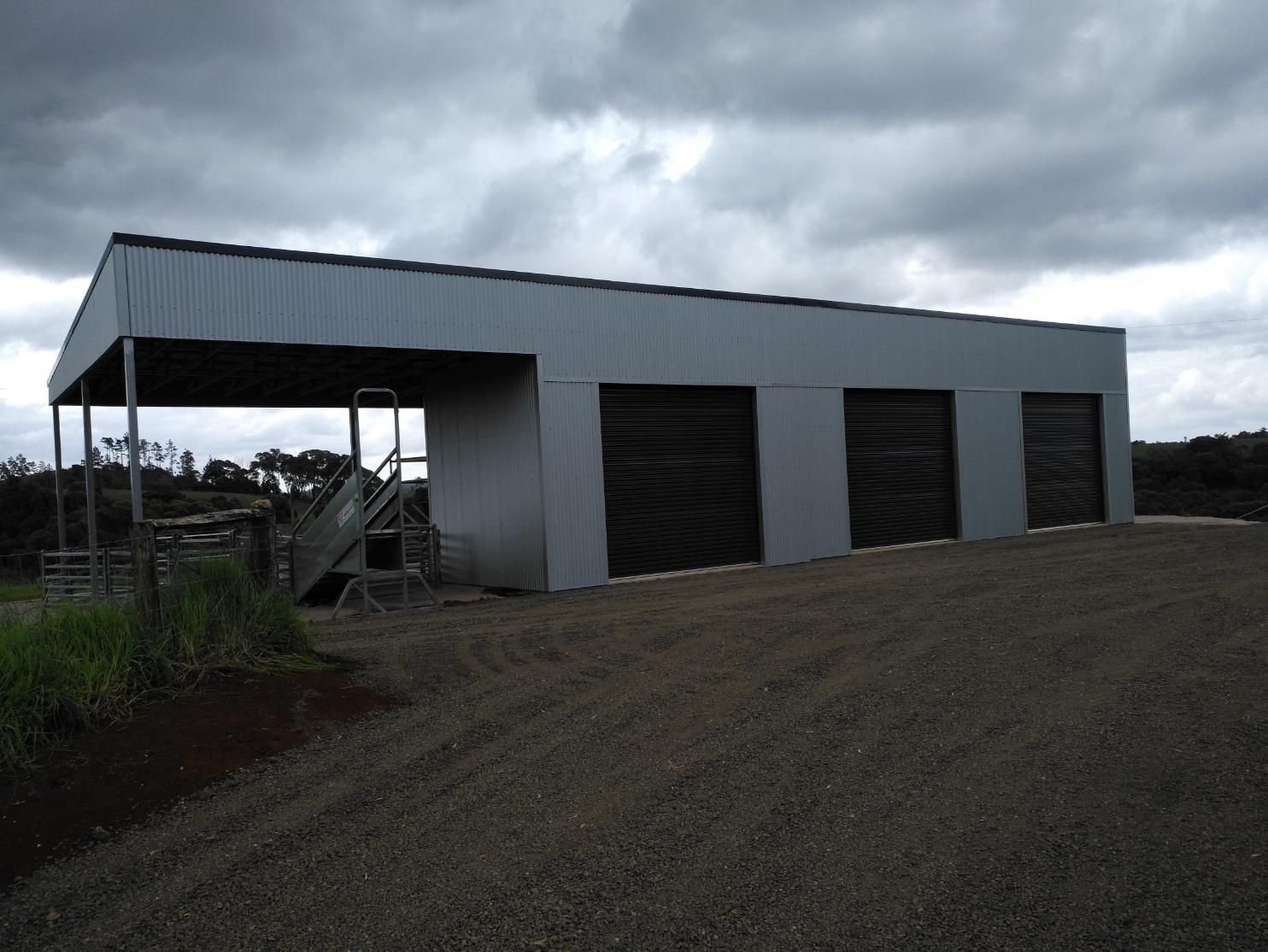A Garage With A Staircase Leading Up To It — Sven Margraf Constructions Pty Ltd In Atherton QLD