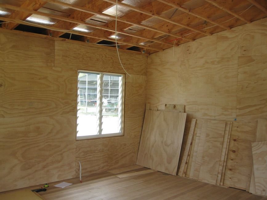 A Room With Plywood Walls And A Window — Sven Margraf Constructions Pty Ltd In Atherton QLD