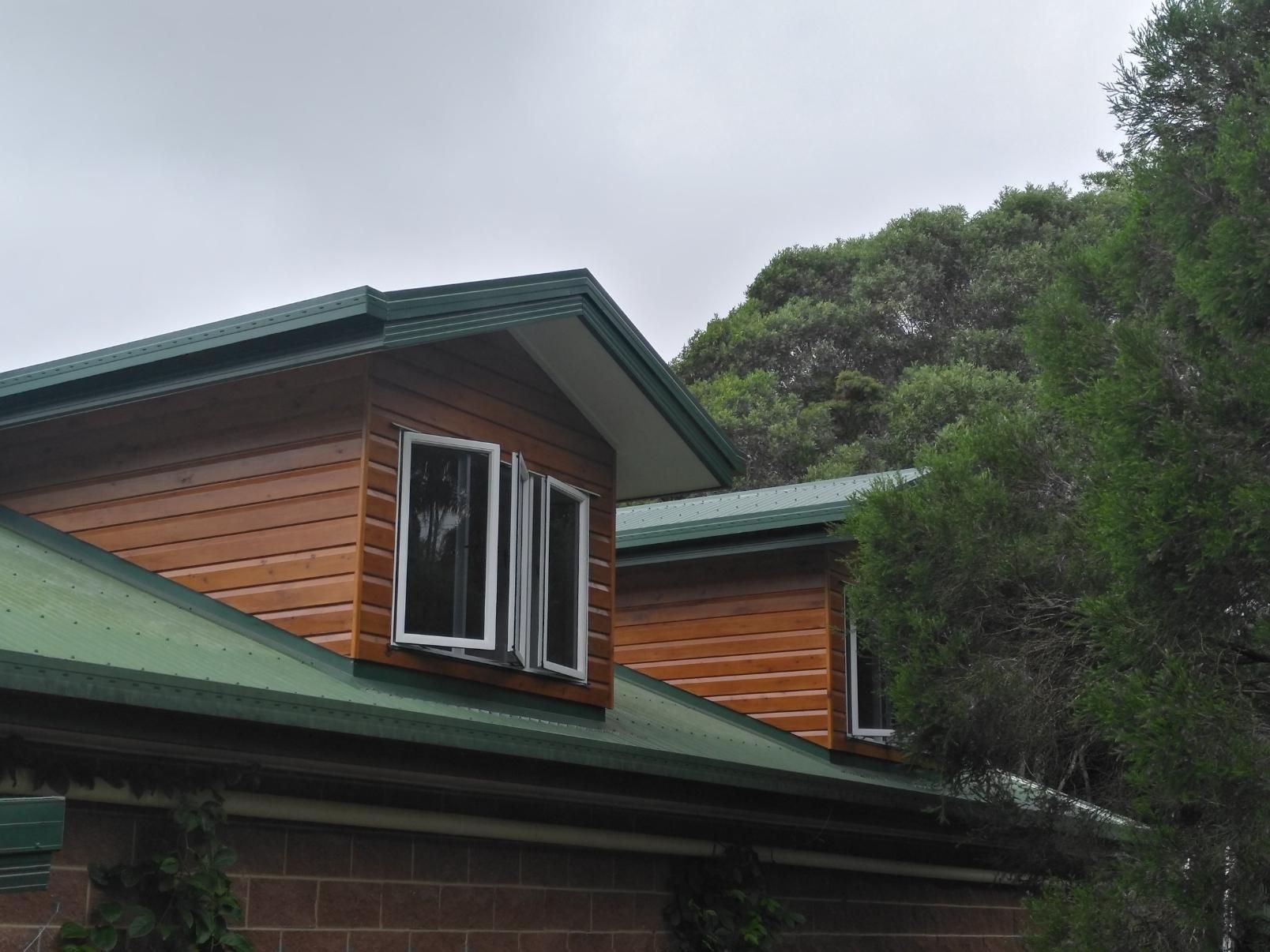 A House With A Green Roof And Two Windows — Sven Margraf Constructions Pty Ltd In Atherton QLD