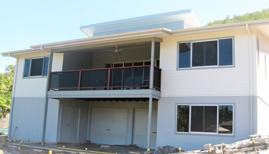 A White House With A Balcony And A Garage — Sven Margraf Constructions Pty Ltd In Atherton QLD