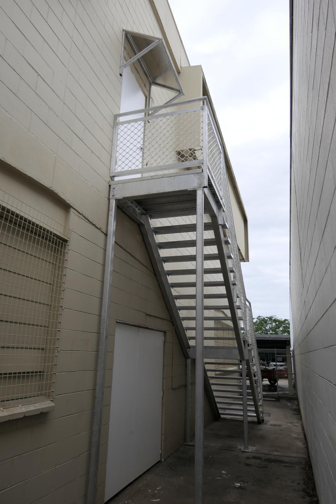 A Set Of Stairs On The Side Of A Building — Sven Margraf Constructions Pty Ltd In Atherton QLD