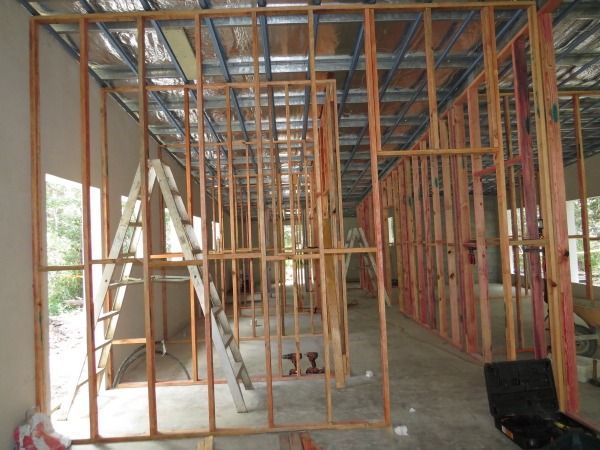 A Ladder Is In The Middle Of A Building Under Construction — Sven Margraf Constructions Pty Ltd In Atherton QLD