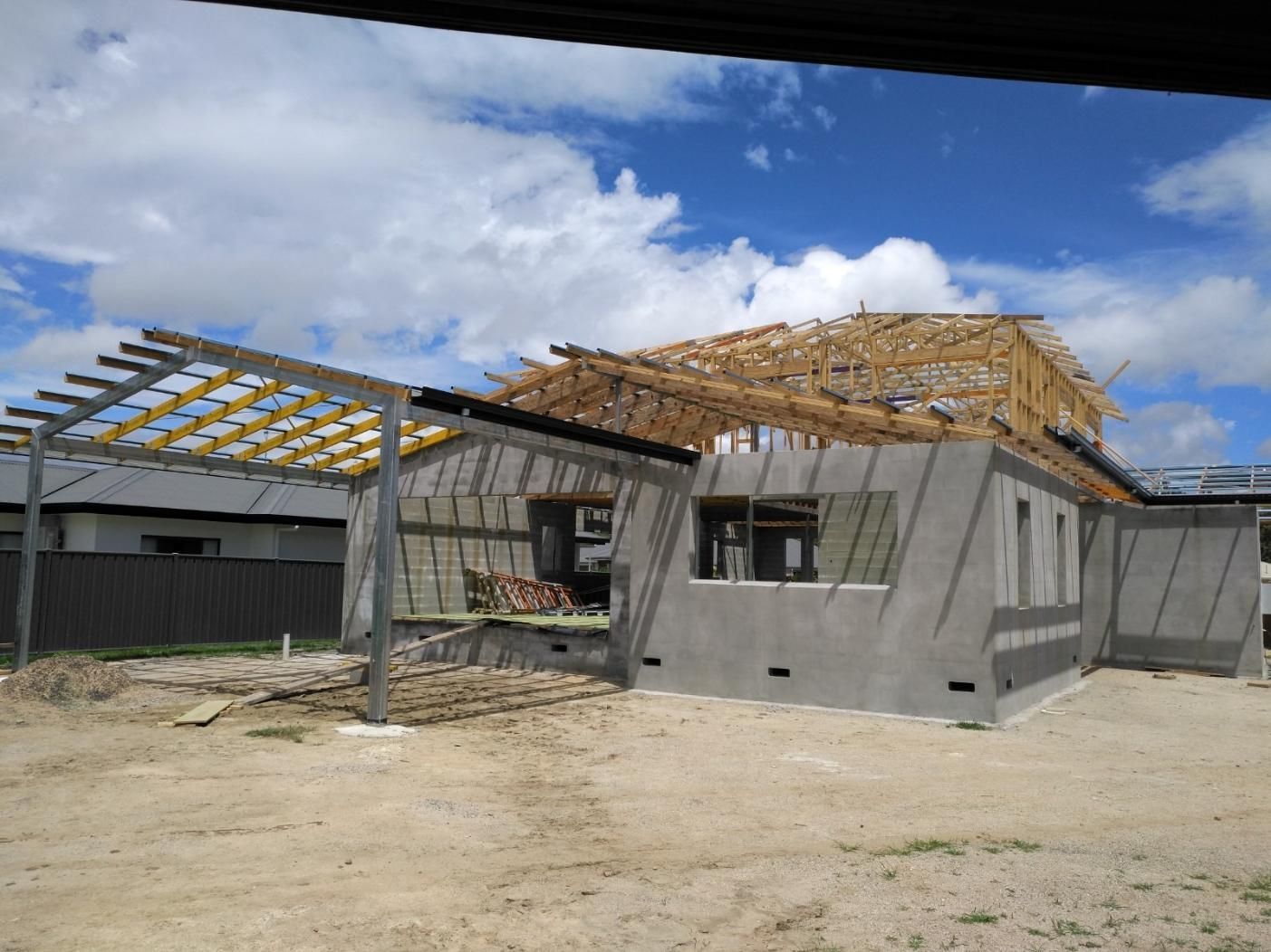 A House Is Being Built With A Wooden Roof — Sven Margraf Constructions Pty Ltd In Atherton QLD