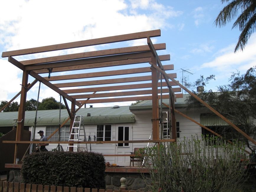 A Wooden Structure Is Being Built In Front Of A House — Sven Margraf Constructions Pty Ltd In Atherton QLD