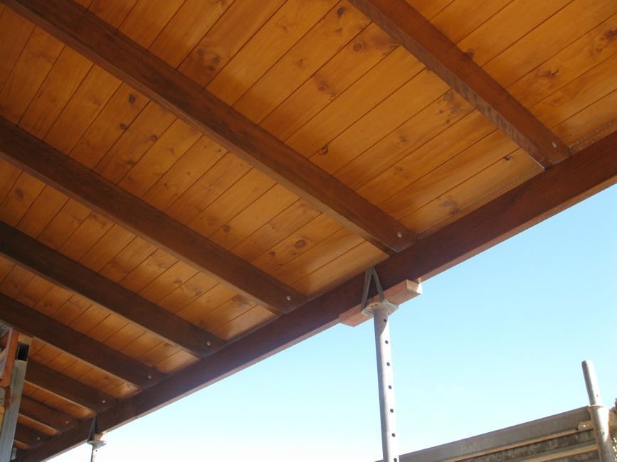 A Wooden Ceiling With A Blue Sky In The Background — Sven Margraf Constructions Pty Ltd In Atherton QLD