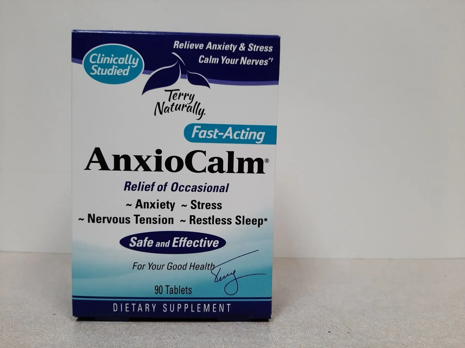 A box of Terry Naturally AnxioCalm dietary supplement tablets for relief of occasional anxiety and stress.