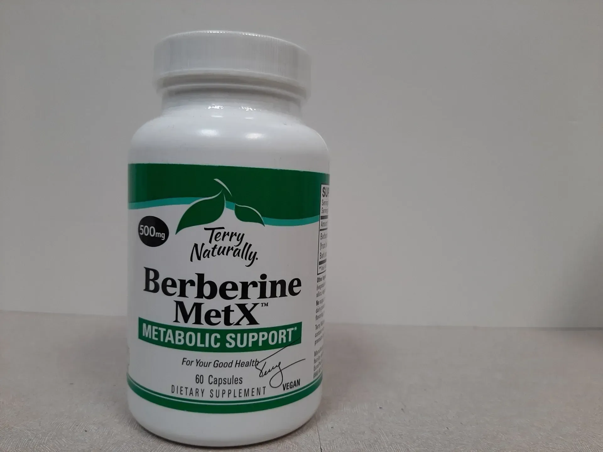 A bottle of Terry Naturally Berberine MetX metabolic support supplement on a plain background.