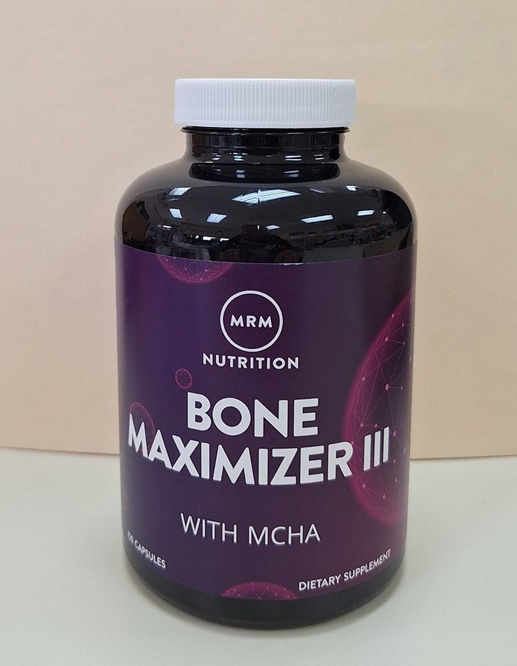 A dark purple bottle of MRM Nutrition Bone Maximizer III with MCHA supplement capsules against a neutral background.