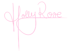 Black handwritten signature reading “Holey Rose” on a white background