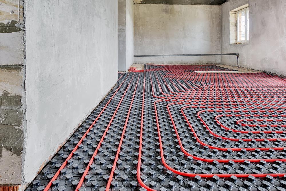 Installation Of A Heat Flooring System In A Country House Under Construction — Sydney Underfloor Heating in Wollongong, NSW