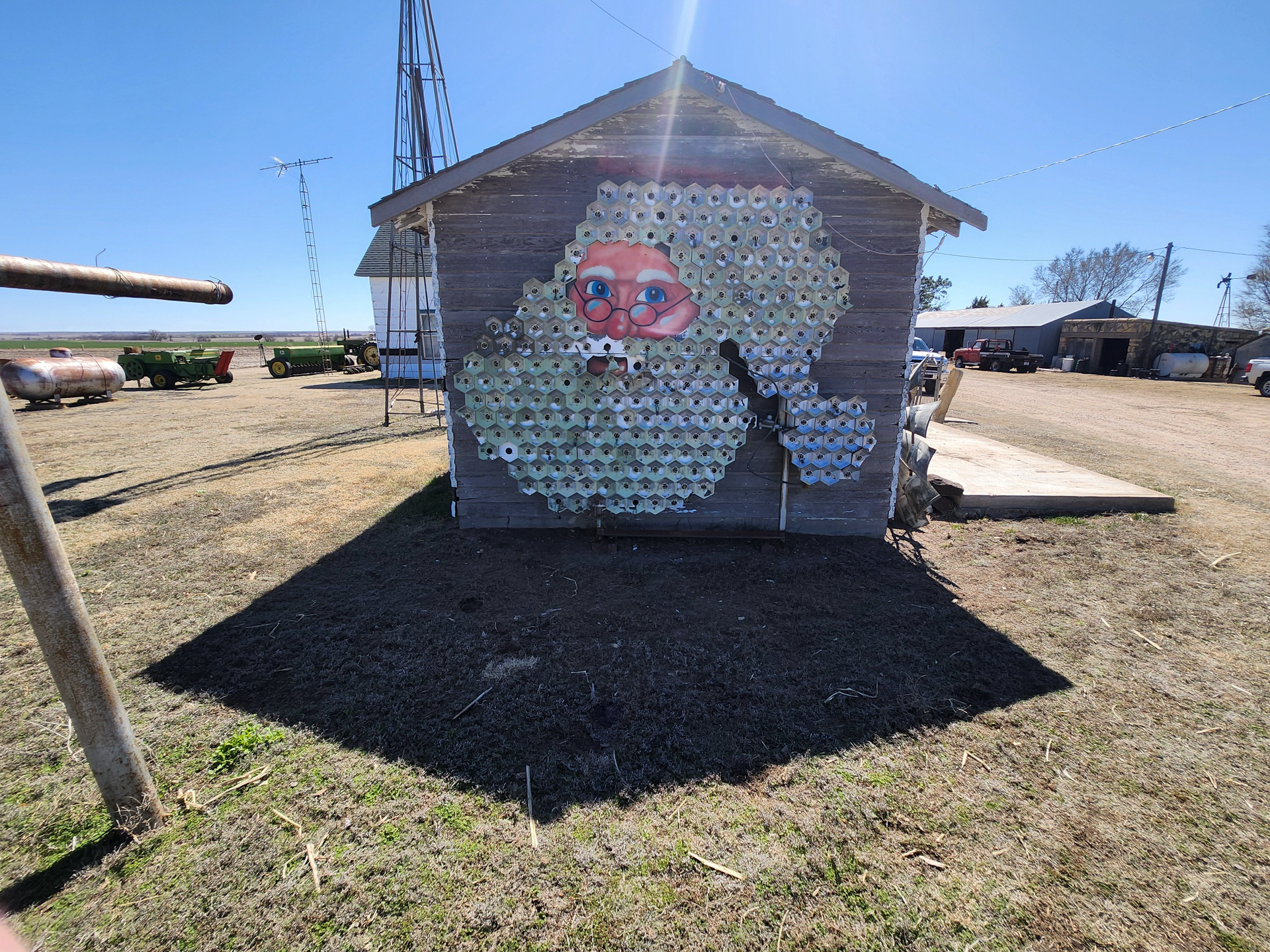 A shed with a painting on the side of it