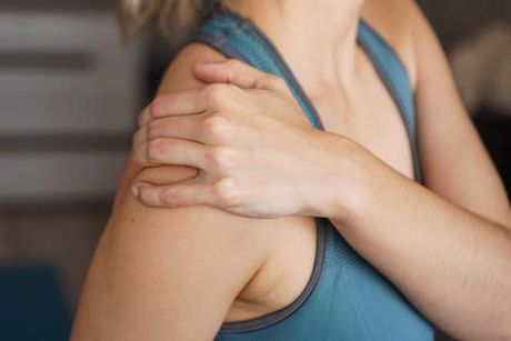 woman having physiotherapy for shoulder pain