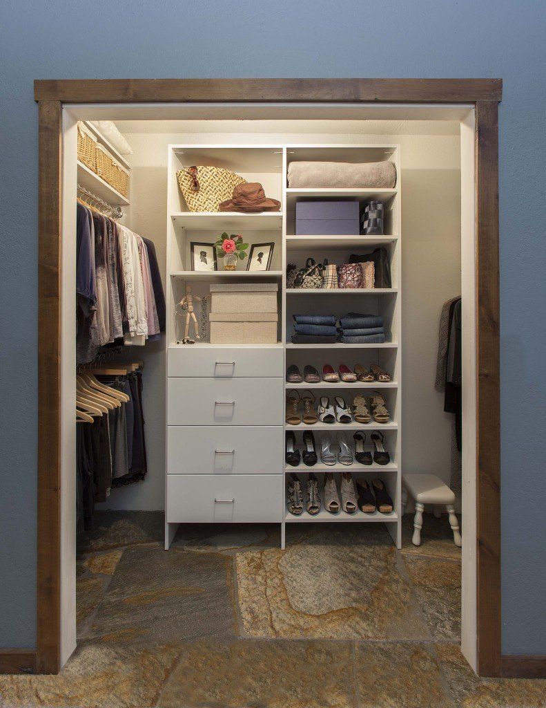 Reach in custom closet system with a white finish