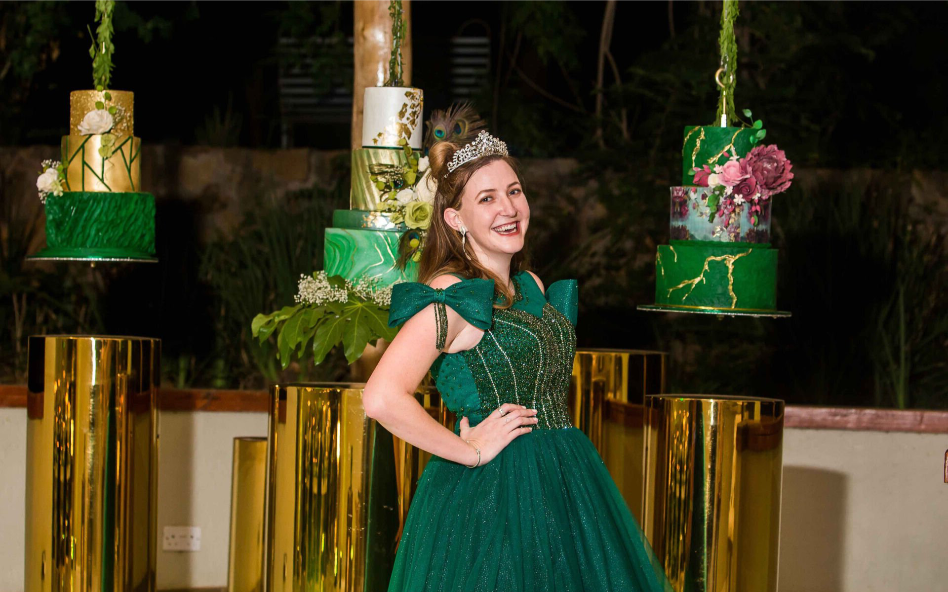 Model Standing In Front of Cakes at Wild Geese Lodge