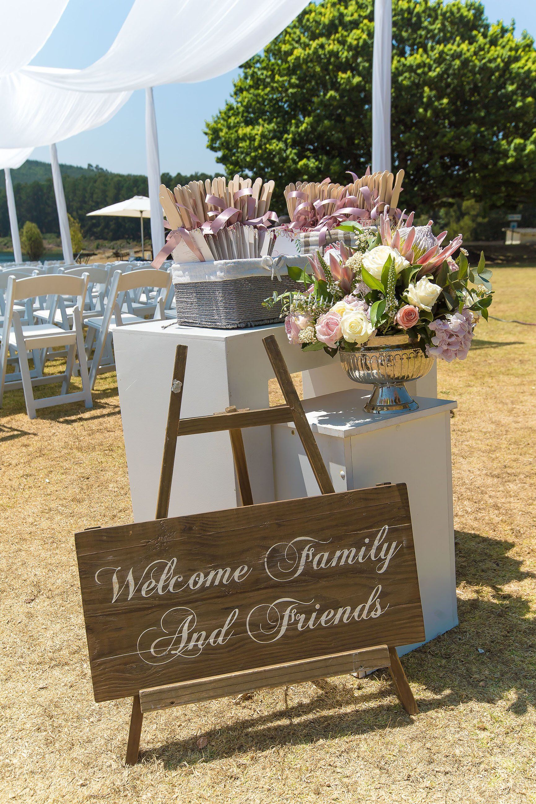 Welcome Fans and Flowers for Guests at Zimbabwe Wedding by Elysian Event Productions