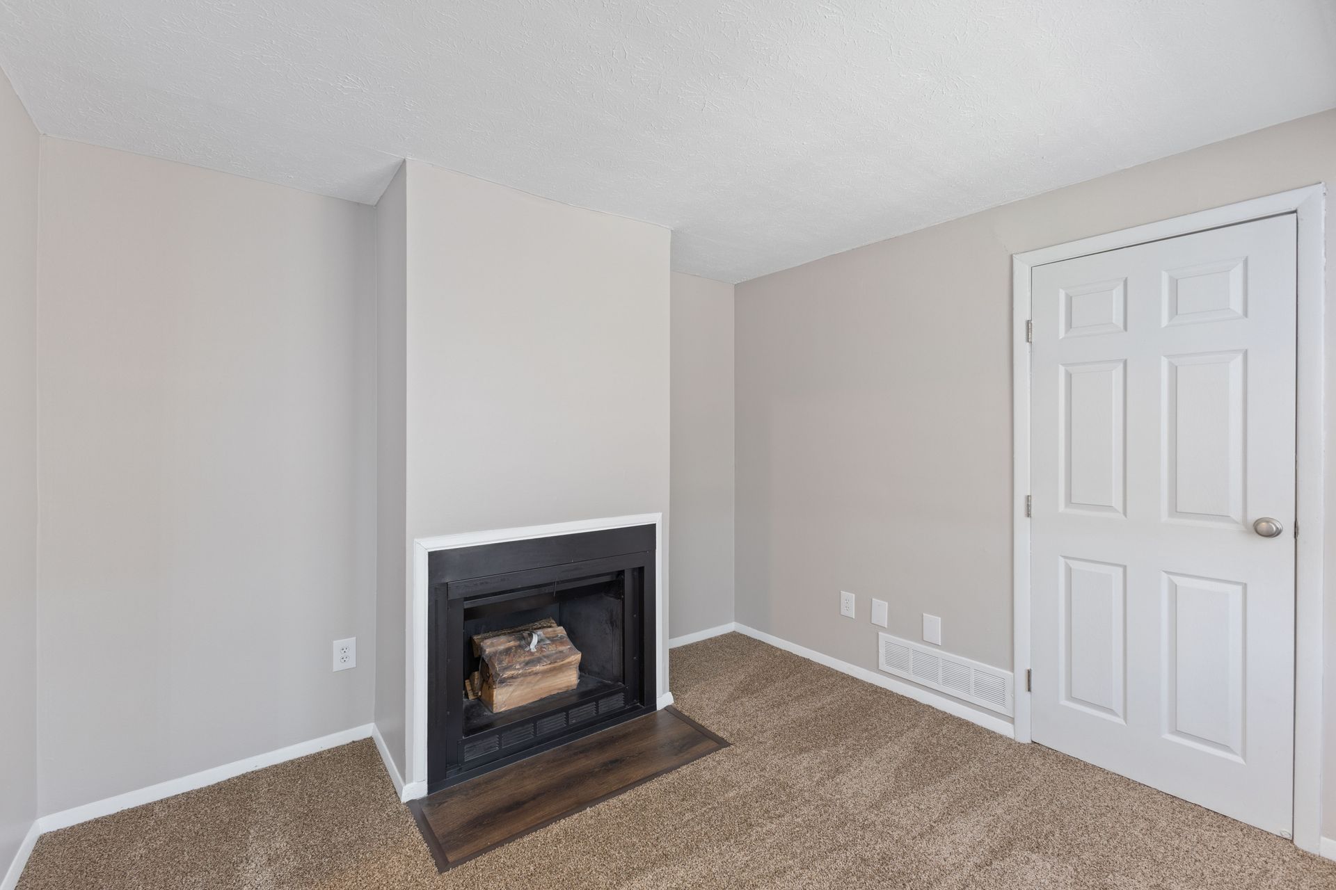 a photo of the electric fireplace at The Wimbledons 