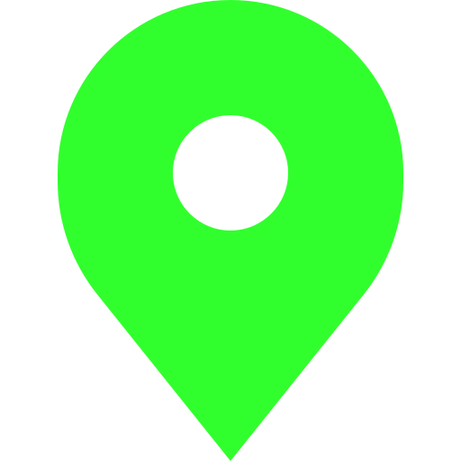A green pin with a white circle in the middle.