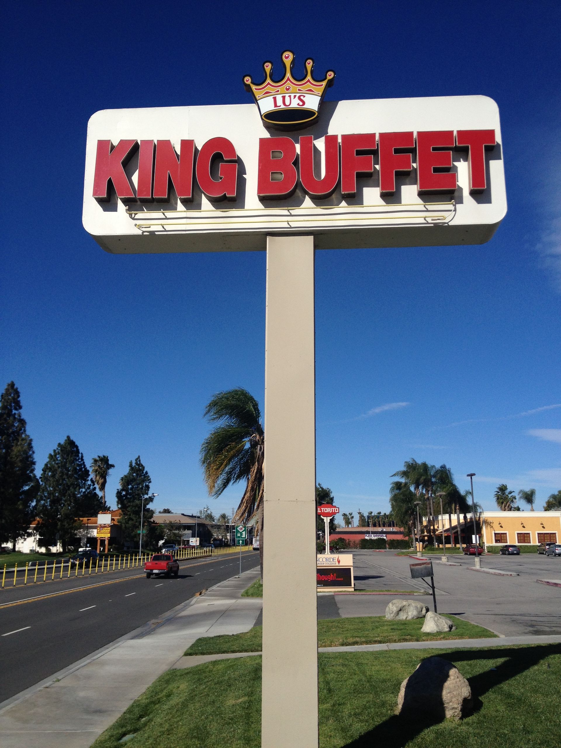 A king buffet sign with a crown on it